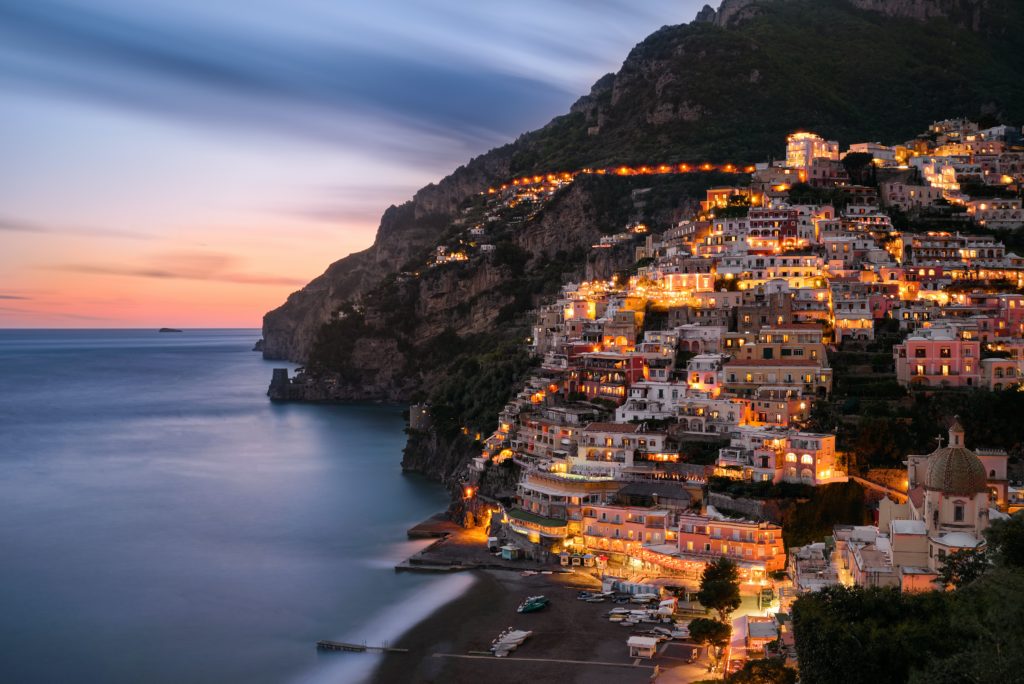 featured in best destinations for young travelers by students fare, this image shows the cliffside town of positano, italy.