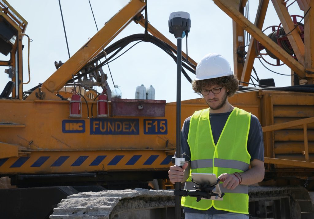 Featured in What Is A Volunteer Trip by Students Fare, this image shows a young student construction worker with habitat for humanity.