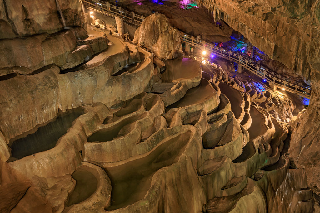 Featured in Students Fare's blog article "Top Cave Explorations for Your Class," which shows Cave in the Jiuxiang scenic region in Yunnan in China. Thee Jiuxiang caves area is near the Stone Forest of Kunming