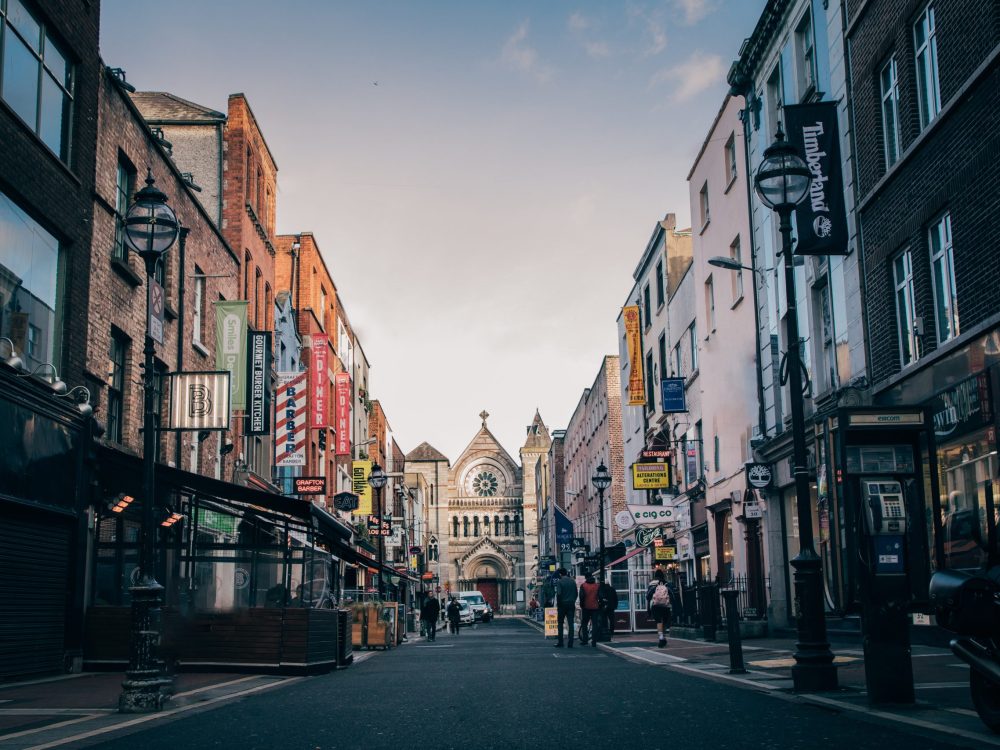 A few student travelers walking the Anne Street tour in Dublin, Ireland.